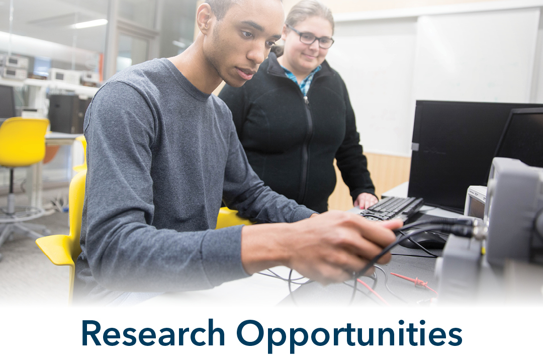 research opportunities; two students in lab working on equipment