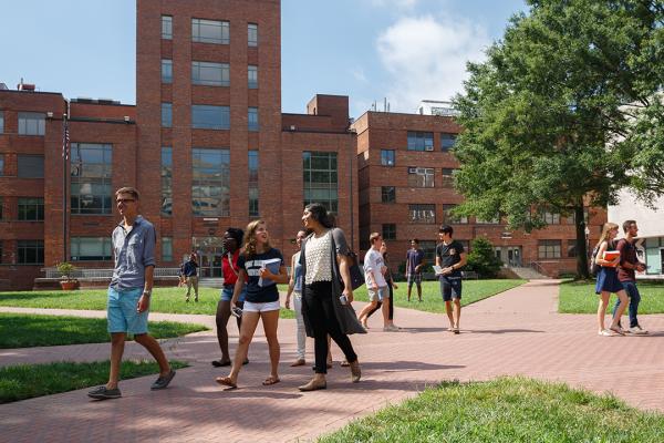 a beautiful sunny day shot of university yard filled with students